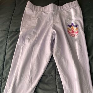 Purple adidas multi colored leggings.🎀